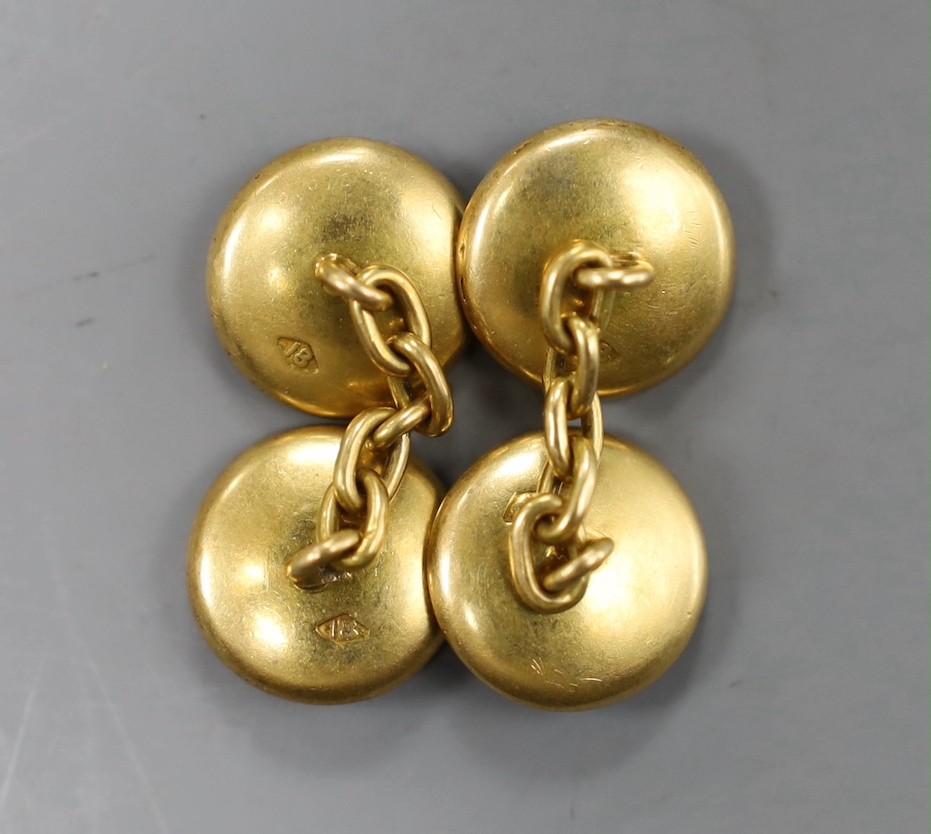 A pair of yellow metal (stamped 18), enamel, mother of pearl and split pearl set disc cufflinks, diameter 12mm, gross weight 8.2 grams.